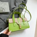 Green and beige contrast handbag in woven and PU leather with golden metal twist lock - Green