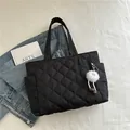Black quilted puffer tote bag with diamond stitching and cute plush doll charm - With Charm / Black