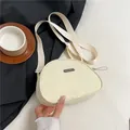 Borsa a tracolla minimalista in nylon crema con ampia tracolla regolabile - Bianco avorio