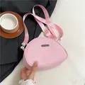 Borsa a tracolla in nylon rosa con cinturino regolabile e placchetta logo metallica - Rosa