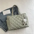 Quilted light green tote bag with cute monster charm decoration in a stylish layout - With Charm / Green
