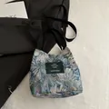 Blue floral jacquard tote bag with black strap handle and vintage fabric texture - Blue Floral Style (Style 5)