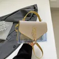 Sac à main bleu transparent avec rabat pailleté champagne et bandoulière jaune - Or