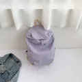 Mochila morada ligera con bordado B.a.g y correas crema para el uso diario casual - Púrpura
