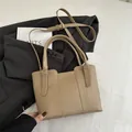 Retro khaki litchi grain bucket bag with double handles and adjustable crossbody strap - Khaki