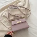 Elegante borsa a mano rosa in tessuto stile Kelly con manico e tracolla - Rosa