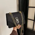 Fashionable black glitter crossbody bag with gold chain strap and S-shaped metal buckle - Black