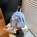 Mini sac à dos bleu clair avec grand nœud élégant en cuir synthétique texturé doux - Bleu