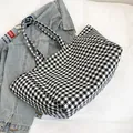 Classic black and white checkered canvas tote bag with large capacity and double handles - Black