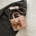Bolso tipo cubo bandolera rosa de PU para mujer con colgante de cachorro tierno y mariposa - Con Colgante / Rosa