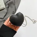 Sparkly black heart shaped mini chain bag with silver glitter finish and metallic strap - Black