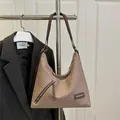 Brown herringbone hobo shoulder bag with leather strap and front zipper accent - Khaki