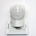 Detailed view of white lace baseball cap featuring elegant sequins and pearl rhinestone chain - Adult (Adjustable Circumference 58cm) / Off White