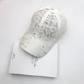 Detail of white floral lace baseball cap with sparkling rhinestones and crystal butterfly - One Size / Off White