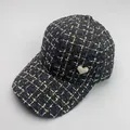 Detailed view of black tweed baseball cap with gold threads and pearl heart decoration - Adult Size (Adjustable) / Black