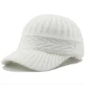 Detail view of white knitted baseball cap showing ribbed and herringbone texture - Adult, Adjustable / White
