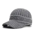 Close-up of gray knitted baseball cap showing ribbed texture and cable knit details - Adult, Adjustable / Gray