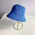 Close-up of royal blue fisherman hat featuring sparkling rhinestone FRANK lettering detail - M (56-58cm) / Blue with Blue Rhinestone