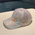Detail view of sequins baseball cap with 3D floral lace and pearl embellishments - Pink Beaded Flower