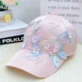 Detailed macro view of pink satin baseball cap featuring 3D floral embroidery and pearls - Adult Size (Adjustable) / Pink Lace Pearl Flower