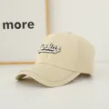 Close-up of beige baseball cap with rhinestone brim chain and 3D Sunday embroidery - Adult Size (Adjustable) / Khaki