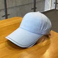 Close-up of light blue ponytail baseball cap with Dallaue embroidery on quick-dry fabric - Adult Size (Adjustable) / Blue