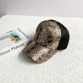 Dettaglio della trama screpolata dorata su cappello in pelle PU con rete nera - L (56-58cm) / Oro champagne