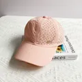 Detail of pink breathable baseball cap with laser-cut holes and gold metal logo - Adult One Size (54-59cm) / Pink