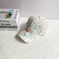 Detail of sweet baseball cap featuring white lace fabric and 3D floral appliques - Adult, Adjustable / Orange