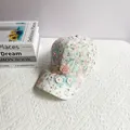 Detail of sweet floral lace baseball cap with 3D handmade flowers and pearl accents - Adult, Adjustable / Pink