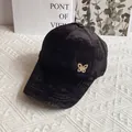 Detailed texture of black velvet baseball cap with sparkling butterfly jewelry embellishment - Adult Size (Adjustable) / Black
