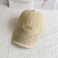 Close-up of rhinestone brim and Take Off embroidery on beige sherpa baseball cap - Adult Size (Adjustable) / Beige