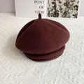 Detailed macro view of dark burgundy wool beret with silver metallic bead trim embellishment - L (54-60cm) / Coffee