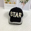 Detail of STAR lettering with pearls and rhinestones on black faux mink baseball cap - Black Iridescent Rhinestone