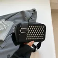 Chic black crossbody camera bag with sparkly sequins and silver rivets on wide strap - Black