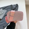 Pink sequin mini crossbody bag with silver studs and adjustable wide nylon shoulder strap - Pink