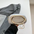 Stylish mini evening clutch in silver with vintage gold horseshoe metal handle - Silver