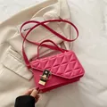 Hot pink quilted crossbody bag with triangle stitching and metallic lock detail - Rose Pink