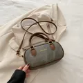 Retro dark green bowling bag with brown handles and adjustable shoulder strap - Black