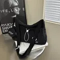 Black pleated canvas tote bag with drawstring detail and matching small round coin purse - Black