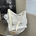 White pleated nylon tote bag with wide strap and fashion coin purse charm - White