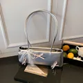 Silver faux leather underarm bag with pink bow, pearl charms and white lace trim - With Pendant / Silver