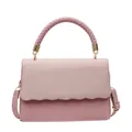 Sac de soirée rose avec rabat tissé et bandoulière réglable aux tons dorés - Rose