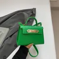 Sac à bandoulière vert texture tressée avec fermoir doré et sangle réglable - Design Tissé / Vert