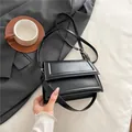 Minimalist black double-flap shoulder bag in high-quality PU leather for women - Black