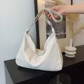 Minimalistische crèmewitte leren draagtas met zilveren rits en verstelbare riem - Rijstwit (Geen Hanger)