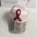 Detail of pink satin baseball cap featuring rhinestone ribbon and crystal brim - Adult Size (Adjustable) / Pink