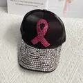 Detail of a denim baseball cap featuring a pink rhinestone ribbon and sparkling brim - Adult Size (Adjustable) / Black