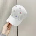 White jacquard baseball cap with colorful rhinestones, mesh bows and beaded tassels - Adult Adjustable / White