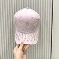 Pink rhinestone baseball cap featuring a diamond butterfly design and sparkling tassels - One Size(Adjustable) / Pink